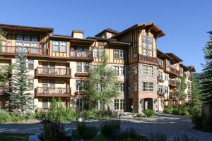 an exterior view of a large apartment building at 1303 - Two Bedroom Deluxe Eagle Springs West condo in Solitude
