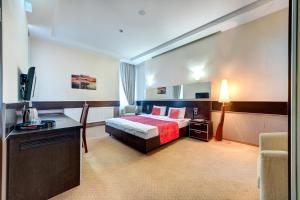 Posteľ alebo postele v izbe v ubytovaní Terra Nova Sport&Spa Hotel