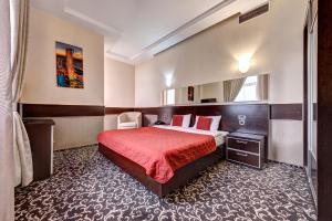 Posteľ alebo postele v izbe v ubytovaní Terra Nova Sport&Spa Hotel