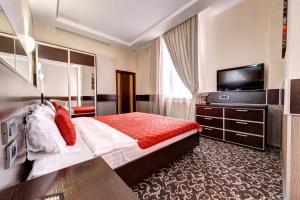 Posteľ alebo postele v izbe v ubytovaní Terra Nova Sport&Spa Hotel