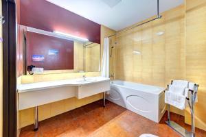 Kúpeľňa v ubytovaní Terra Nova Sport&Spa Hotel
