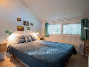 Postel nebo postele na pokoji v ubytování Holiday home Fanø LXVI