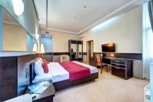 Posteľ alebo postele v izbe v ubytovaní Terra Nova Sport&Spa Hotel