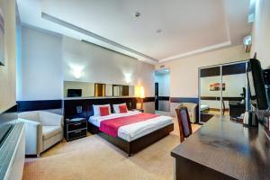 Posteľ alebo postele v izbe v ubytovaní Terra Nova Sport&Spa Hotel