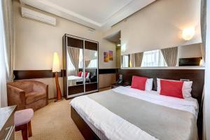 Posteľ alebo postele v izbe v ubytovaní Terra Nova Sport&Spa Hotel