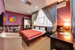 Posteľ alebo postele v izbe v ubytovaní Terra Nova Sport&Spa Hotel