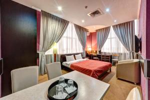 Posteľ alebo postele v izbe v ubytovaní Terra Nova Sport&Spa Hotel