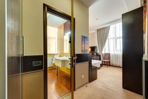 Posteľ alebo postele v izbe v ubytovaní Terra Nova Sport&Spa Hotel