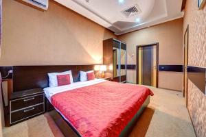 Posteľ alebo postele v izbe v ubytovaní Terra Nova Sport&Spa Hotel