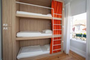 Cama ou camas em um quarto em VisHostel