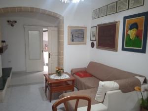 Ein Sitzbereich in der Unterkunft "CVPERTINVM" casa per brevi periodi