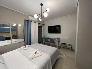 TV a/nebo společenská místnost v ubytování City House Comfort 2