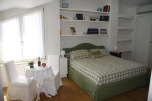 A bed or beds in a room at B&B al 19