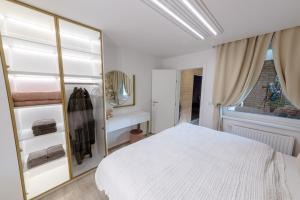 Postel nebo postele na pokoji v ubytování Apartman Stari Toranj III