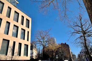 a tall building with a blue sky in the background at Loft Menorca & Spa 5 étoiles au cœur de Nancy in Nancy