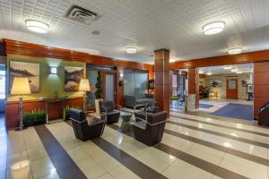 a lobby of a hospital with chairs and a waiting room at Quality Inn Toronto Airport in Mississauga