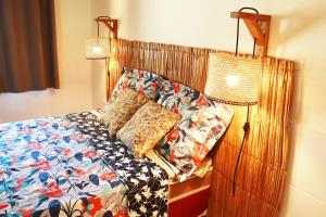 Postel nebo postele na pokoji v ubytování Santo Hostel