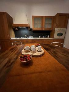 Кухня или мини-кухня в Il Grappolo d’Alba
