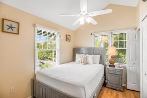 Llit o llits en una habitació de Palm Breeze