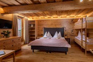 Postel nebo postele na pokoji v ubytování Das kleine Bio Hotel Tiefenbach