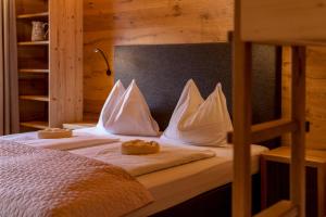 Postel nebo postele na pokoji v ubytování Das kleine Bio Hotel Tiefenbach