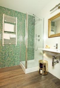 a bathroom with a shower and a sink at Albergo Al Viale in Trieste