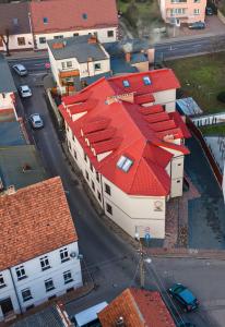 an overhead view of a building with red roofs at Villa Marcelina-Buk in Buk