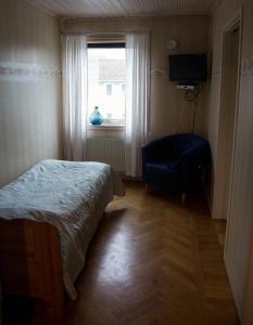 Postel nebo postele na pokoji v ubytování Pensionat Ekholmen