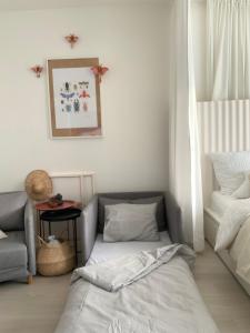 Posteľ alebo postele v izbe v ubytovaní Light Room by Zoom Apartments