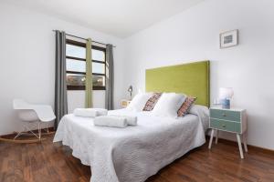 Posteľ alebo postele v izbe v ubytovaní FTV Holidays Homes