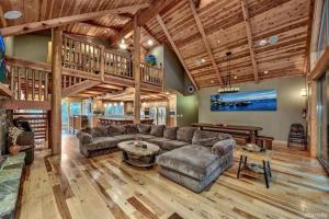 a living room with a couch and a table at Skier's Dream! Mansion Right Next to Heavenly in South Lake Tahoe