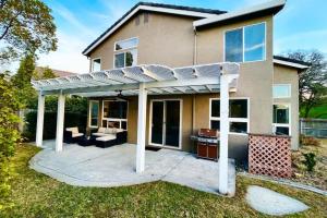 a house with a pergola on a patio at King Bed Quiet Home on Cul-de-Sac Hiking Trails in Roseville
