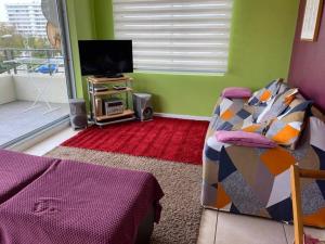 TV/trung tâm giải trí tại Depto amplio y cómodo para 6 a una cuadra playa