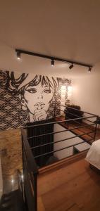 A bed or beds in a room at Sant'Andrea - Luxury Rooms in Vucciria