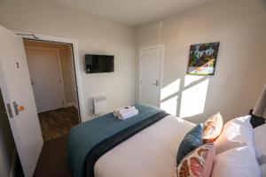 Voodi või voodid majutusasutuse The Amberley Hotel toas