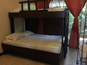Voodi või voodid majutusasutuse Cabinas surf Arribadas toas