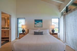 Säng eller sängar i ett rum på Mauna Kai 5B