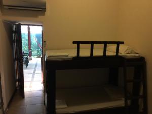 Voodi või voodid majutusasutuse Cabinas surf Arribadas toas