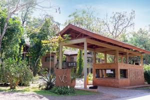 a pavilion in front of a building at Village Cataratas in Puerto Iguazú