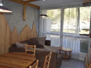 Et sittehjørne på Appartement Villard-de-Lans, 2 pièces, 7 personnes - FR-1-689-56