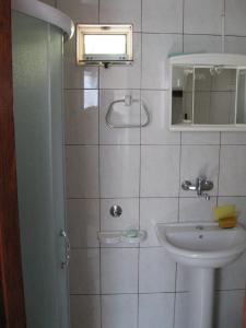 A bathroom at Apartments Olga