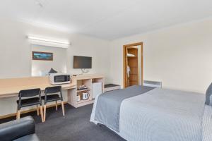 TV a/nebo společenská místnost v ubytování Martin Cash Motel
