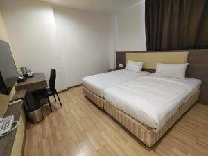 Hotel MetraSquare客房内的一张或多张床位
