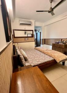 a bedroom with two beds in a room at House Of Comfort Delhi in New Delhi