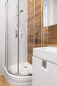 Kúpeľňa v ubytovaní Househost Apartment: Bonerowska 5/19