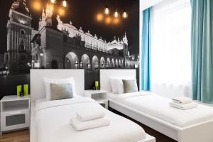 Posteľ alebo postele v izbe v ubytovaní Househost Apartment: Bonerowska 5/19