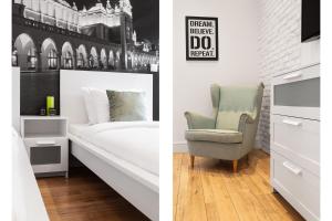 Posteľ alebo postele v izbe v ubytovaní Househost Apartment: Bonerowska 5/19