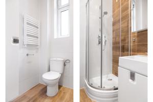 Kúpeľňa v ubytovaní Househost Apartment: Bonerowska 5/19