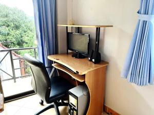 TV a/nebo společenská místnost v ubytování Lamai Guesthouse