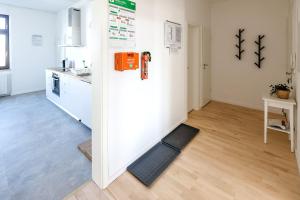 Kuchyň nebo kuchyňský kout v ubytování Modern & Chic Apartment with Balcony in Offenbach